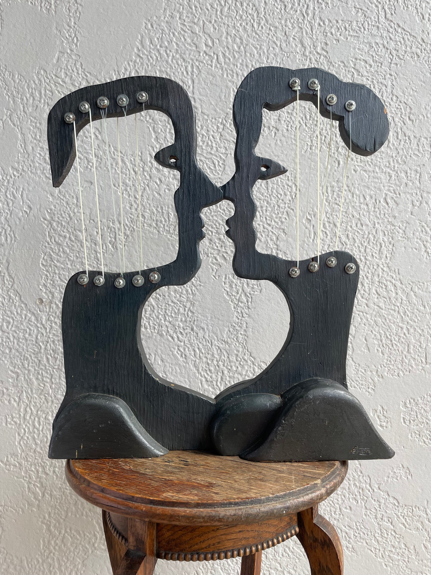 Folk Art Carved Wood and Piano Wire Kissing Couple